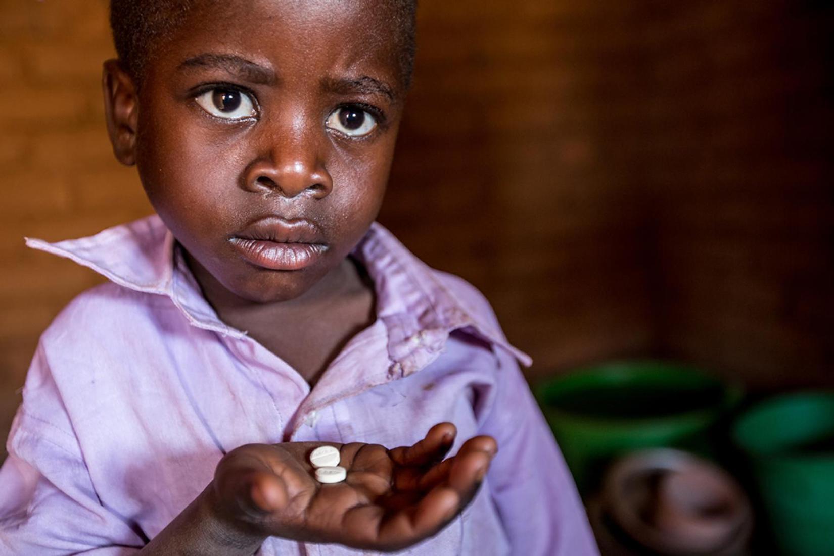 Lorenzo tem três anos e vive com HIV em Maláui, na África Ocidental. Foto: UNICEF / Schermbrucker